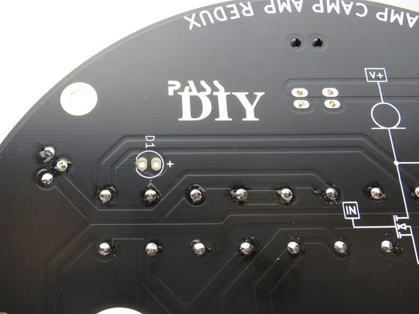 There are a couple things to stuff on the other side, these will point 'up' during normal operation.