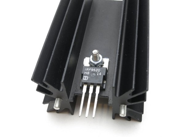 1) Attach the Mosfet to the heatsink but leave slightly loose.