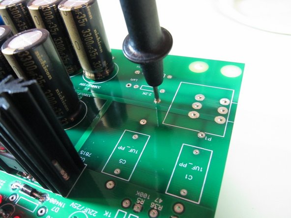 Place your meter to DC volts and measure the V+ rail between the ground pad near the pot and the square pad of capacitor C9. (Or both pads of C9, red on square and black on the round) This should read approximately +17V give or take a volt.