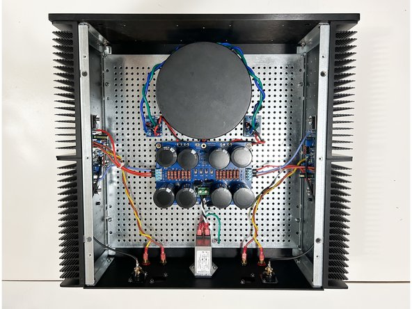 If you have a brand new chassis, the feet should be installed prior to attaching the bottom panel to the heatsinks.