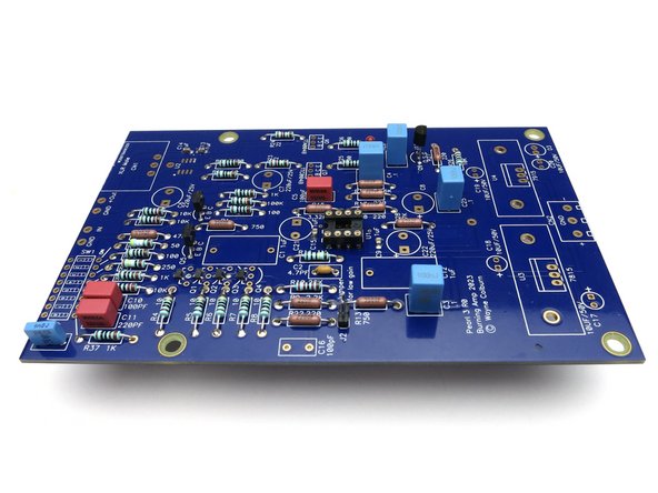 Insert film capacitors and solder.