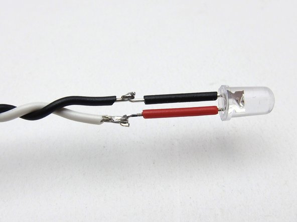 Do not connect them to DC without a resistor in series. Connecting them directly to your 24V power supply will fry them instantly.  Here's 3 methods to safely check the color: