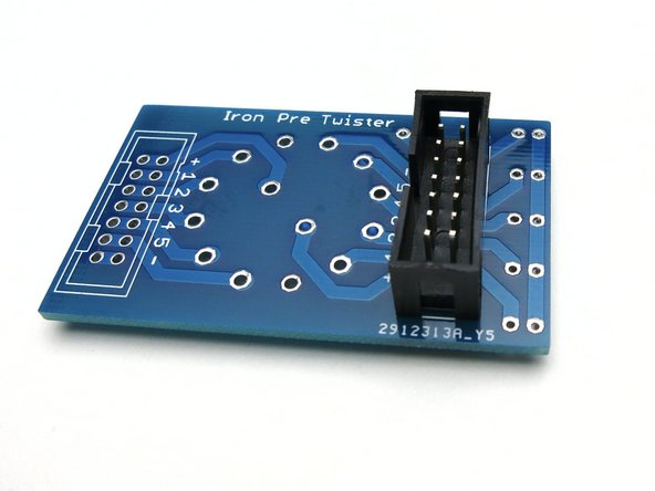 Photo 1 - Install the header noting the alignment of the indexing notch.  Only one header is required for the Iron Pre SE.  It should be installed on the side of the board closest to the LEDs.