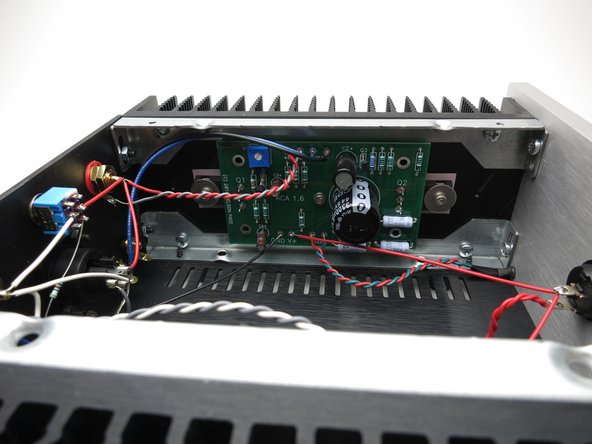 Barrel connector has the double red to the power switch on the center pin, and the black power GND wires to the tab.