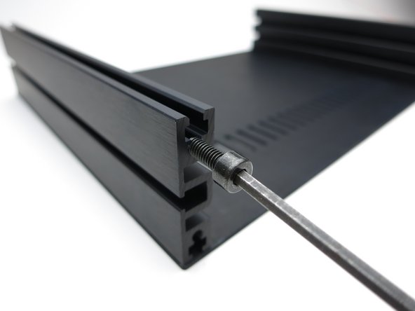 Photo 3 - The screws go the threaded section, not the channel where the nuts are.