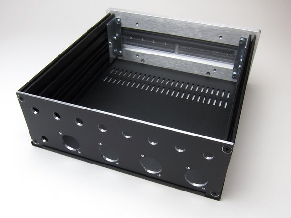 Insert the nuts in to the extrusion before attaching the back panel.