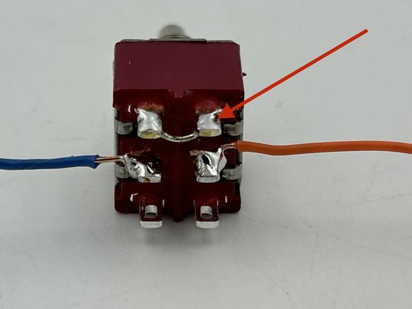 Use a small scrap of bare CAT 5 wire to connect the terminals on either end of the switch.