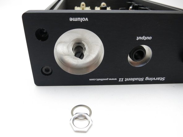 The headphone jack nut is a little difficult to tighten. It doesn’t have to be real tight. Get it as far in as you can by hand, then use needle nose pliers to fit into the notches and tighten it a little more. Be careful not to scratch the front panel when doing this!