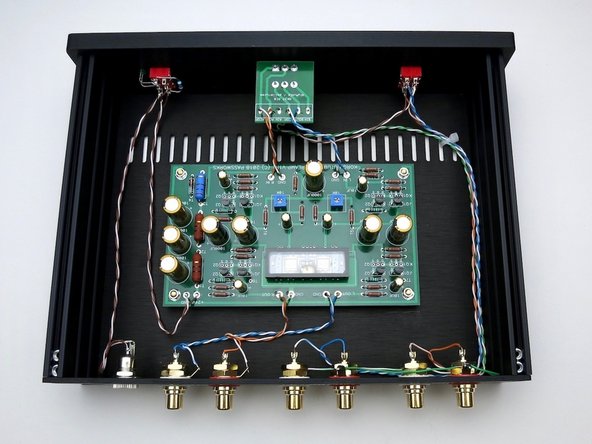 Attach wires from potentiometer to Korg PCB Blue and white/blue for Left.      Orange and white/orange for Right.