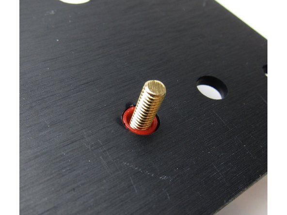 Tip - Make sure that the binding posts are installed with the red posts to the left and right edges of the back panel and the black binding posts in the middle. Photos are to demonstrate the order of assembly.