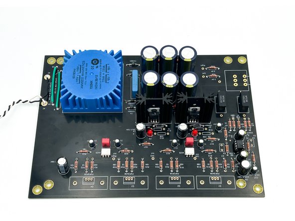 Verify the orientation of the electrolytic capacitors!  The negative side a.k.a. the cathode is indicated with a band.  The cathode lead is the shorter of the two leads.  The positive side a.k.a. the anode is the longer of the two leads.  The anode aligns with the square pad.  A (+) is also indicated on the silkscreen.