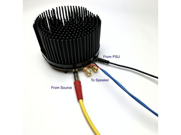 PSU attaches to the black barrel jack.