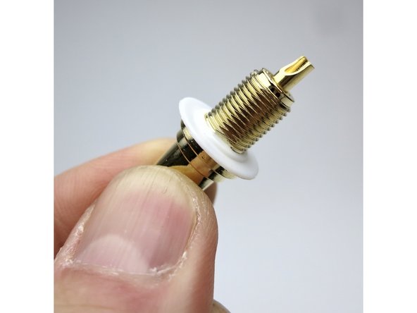 Place the shoulder washer here as shown