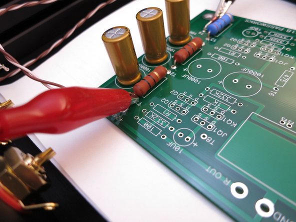 Connect the power switch wires to the PCB (Step 40 - Photo 3) and power it on. Connect meter to places shown and you should have about 24V.