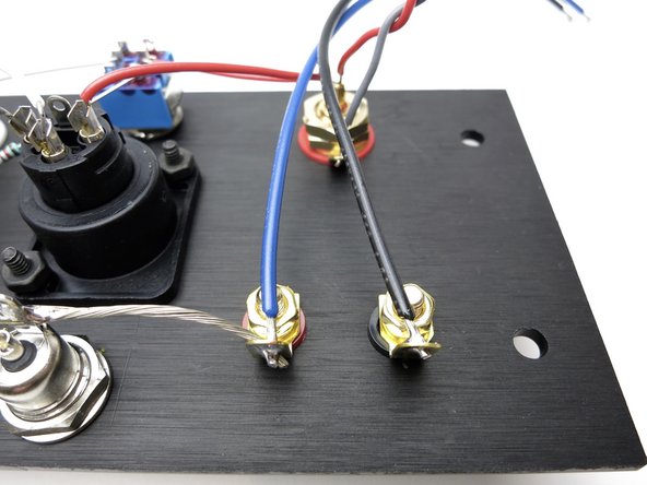 Solder black heavy wire to black speaker posts.
