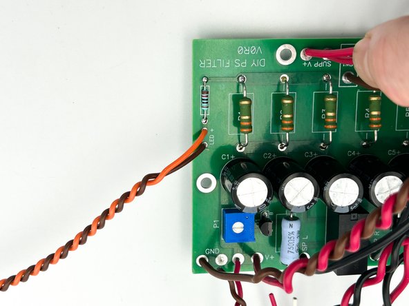 Solder the LED to the wires:  the long lead (+ Anode) and the short lead (- Cathode)