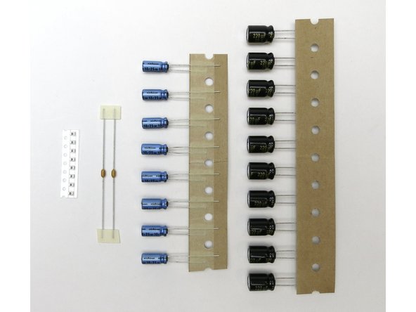 Photo 2, L to R, 1uF SMD, 4.7pF, 10uF, 220uF
