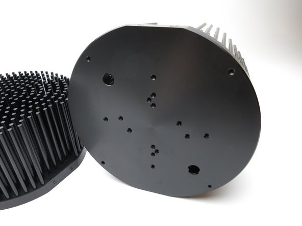 The PCB was designed to take advantage of the existing holes in the heatsink, requiring no drilling by the builder. A very smart design.