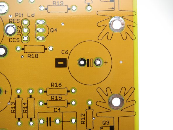 The outline of the small transistors also has a flat side to help in placement.
