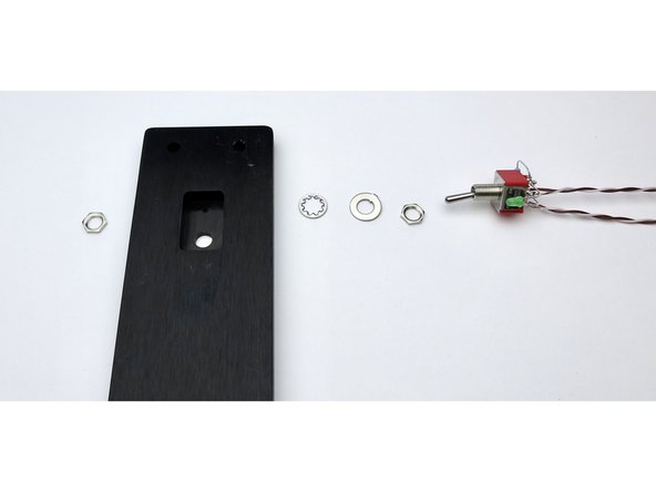 Assemble switch to front panel - nut/front panel/star washer/flat washer/nut.