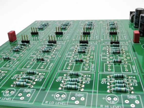 Photo 2 - The will fall out of the PCB if you don't secure them in somehow, it's easiest to use a little tape as shown.