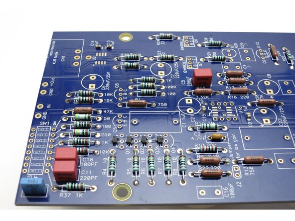 Insert film capacitors and solder.