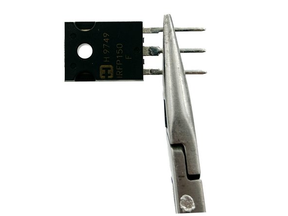 Photos 1, 2, and 3 - It is simple to get a proper bend in the MOSFET legs, but care must be taken.  These photos illustrate a proper sequence.  The part is held just below the narrowing point in the legs, and the legs are bent to 90 degrees.