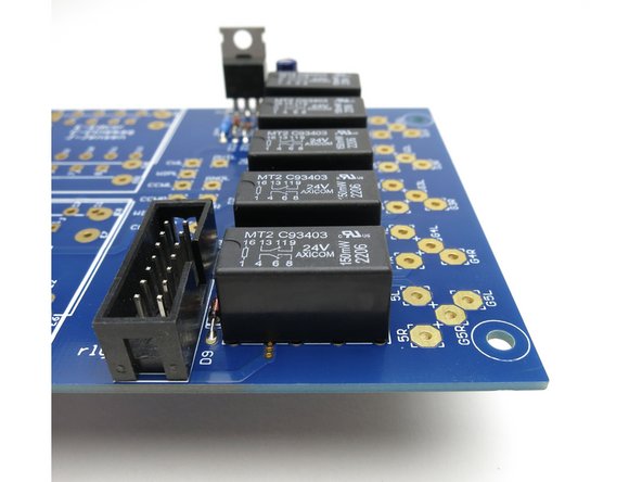 Photo 1 - Note the proper orientation of the box header.  The notch lines up with the silkscreen image.  This is critical when using an indexed cable and header.