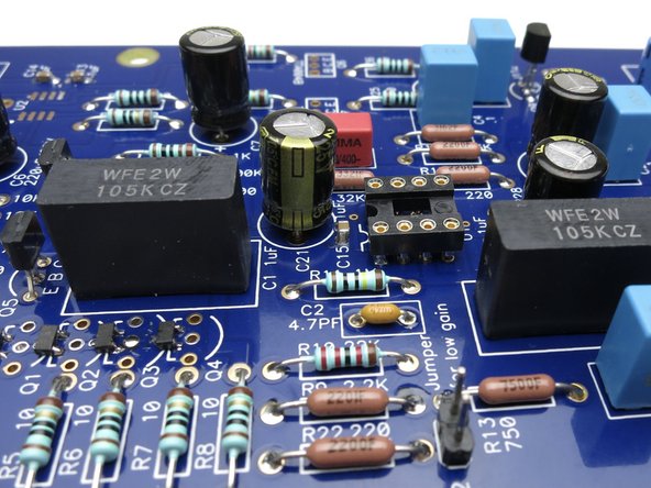 Insert film capacitors and solder.