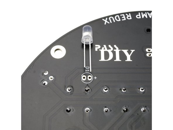 Insert the long leg of the LED into the + hole.