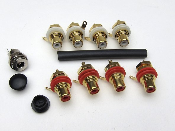 8 RCAs included (it will be the same parts kit for the 3-way version), heatshrink, hole plugs.