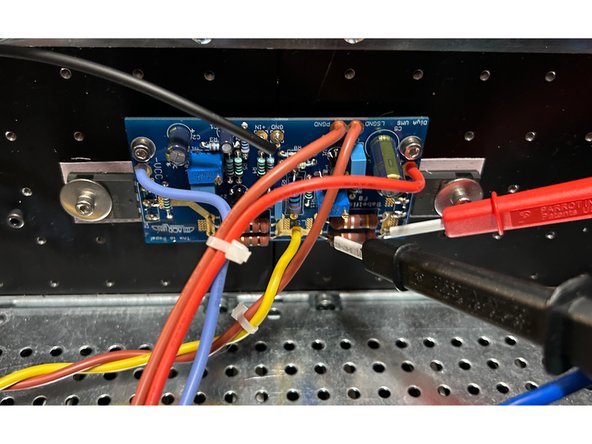 With the mains power disconnected, wire one channel of the amplifier board to the power supply; +VCC (V+), -VCC (V-), and PSGND (GND).