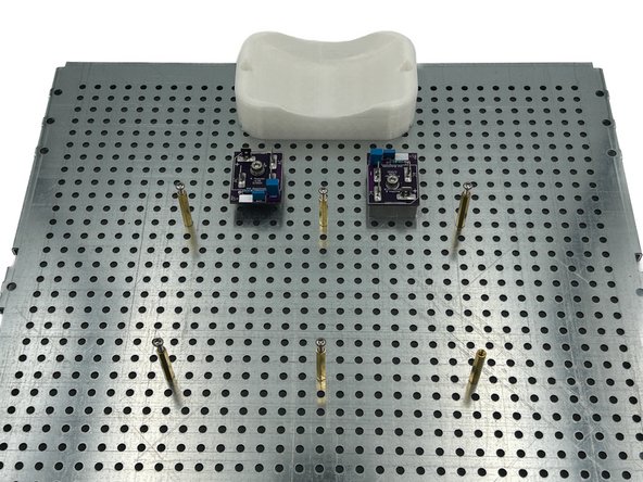 Photo 3 - This photo shows a cool throne to vertically mount a toroid (designed by fellow DIYer, Birdbox) along with a  rough layout of where I anticipated the rectifiers and main PSU board being mounted to the perforated baseplate.