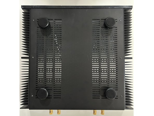 Install the feet onto the bottom panel of the chassis, and install the bottom panel.