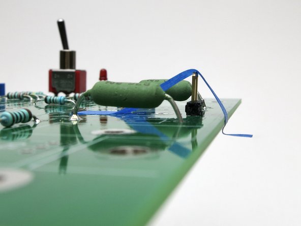 Don't try to hold them on with a finger whilst soldering, that is a fantastic way to burn yourself.