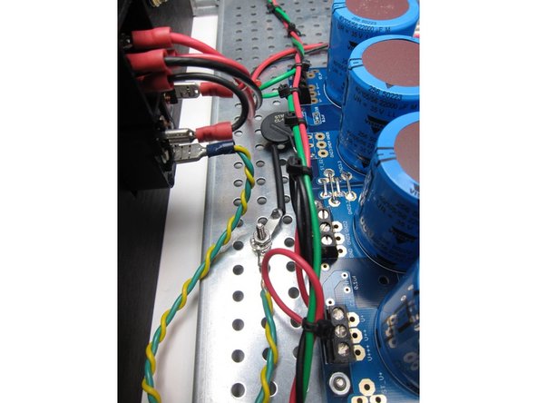 Safety earth (Green Yellow) is connected from the power switch module to the chassis. Use a star washer to ensure a solid connection.