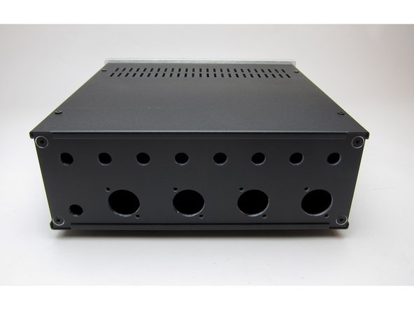 Feet stick on the bottom. (Not shown)