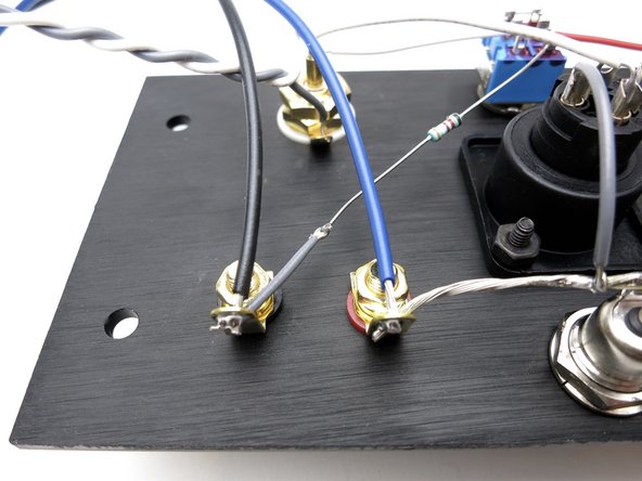 Solder black heavy wire to black speaker posts.