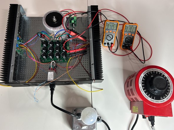 Power the circuit.  If you are using a variable transformer, slowly increase the voltage until you reach full mains voltage.