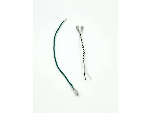 Cut approximately 6&quot; of the green wire.  Crimp and/or solder one 6.3mm female spade connector to one end.  Slide the spade insulator onto the wire and over the spade. Crimp and/or solder one ring terminal to the other end.  Note - The insulation was removed from the ring terminal allowing it to be crimped and soldered.