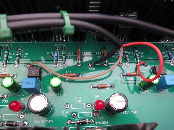 Second image: Input at PCB. In this photo the ground wire is mostly hidden by the jacketed cable.