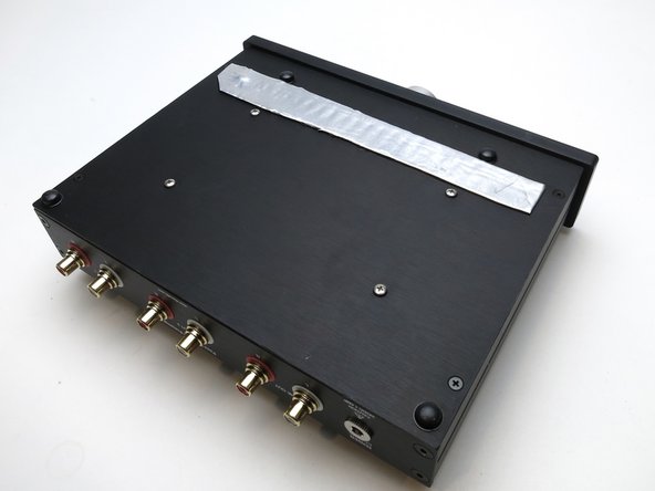 This is a self-adhesive rubberized material similar to Dynamat.