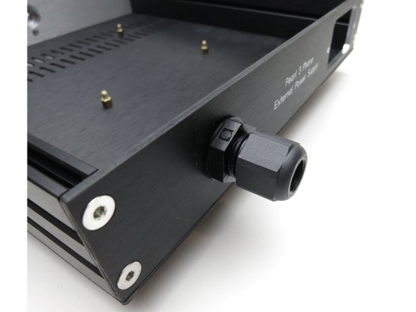 Mount cable gland on rear panel.