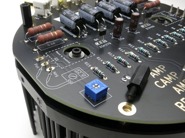 Make sure all the transistor legs are in the holes, then,