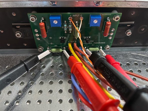 With the mains power disconnected, wire one channel of the amplifier board to the power supply; V+, V-, and GND.  (If you had both channels connected previously to rough in your wiring, disconnect the V+ and V- from one amplifier board.)  You should test one channel at a time.