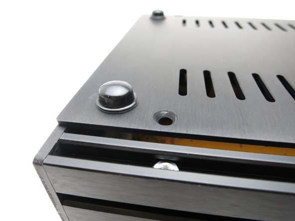 Photo 2 and 3 - It's helpful to align the nuts in the rails with the holes before attaching the bottom panel with the screws.