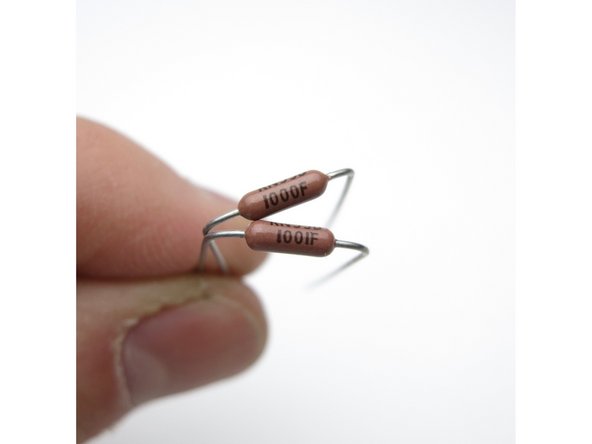 Photo 1 - The Dale resistors have their value marked in digits on the side This is 3-digit+multiplier The top resistor is 100 ohms -- 100+0, or &quot;one hundred ohms and zero zeroes&quot; The bottom is 1K -- 100+1, &quot;one hundred and one zero&quot;