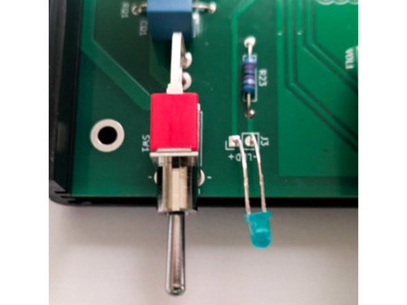 Gently bend the legs of the LED so that the tip of the bulb extends beyond the edge of the chassis. It does not need to be perfect. The LED should sit about 1/4" (6.5mm) above the PCB.
