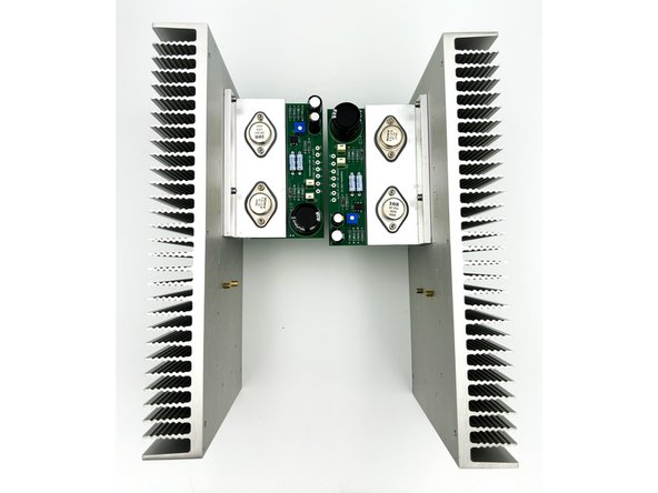 Install two brass standoffs as shown.  Finger tight is perfectly fine.