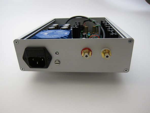 Second image: Use this photo as an example of what NOT to do -- please move the IEC inlet to the middle of the back panel to get it away from the transformer.